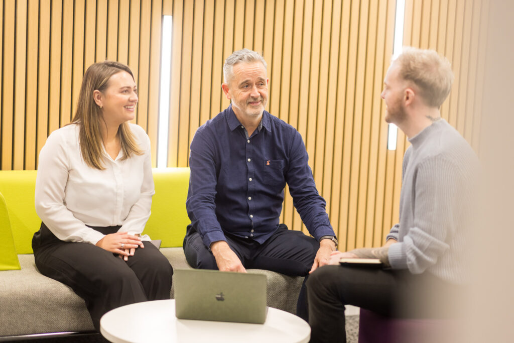 Darren Stott talking with Shelley Hall and James MacRae